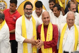 Former Union minister RCP Singh (in red kurta) merged his party Aap Sabki Awaaz (ASA) with Prashant Kishor's Jan Suraaj Party (JSP) in Patna on Sunday.