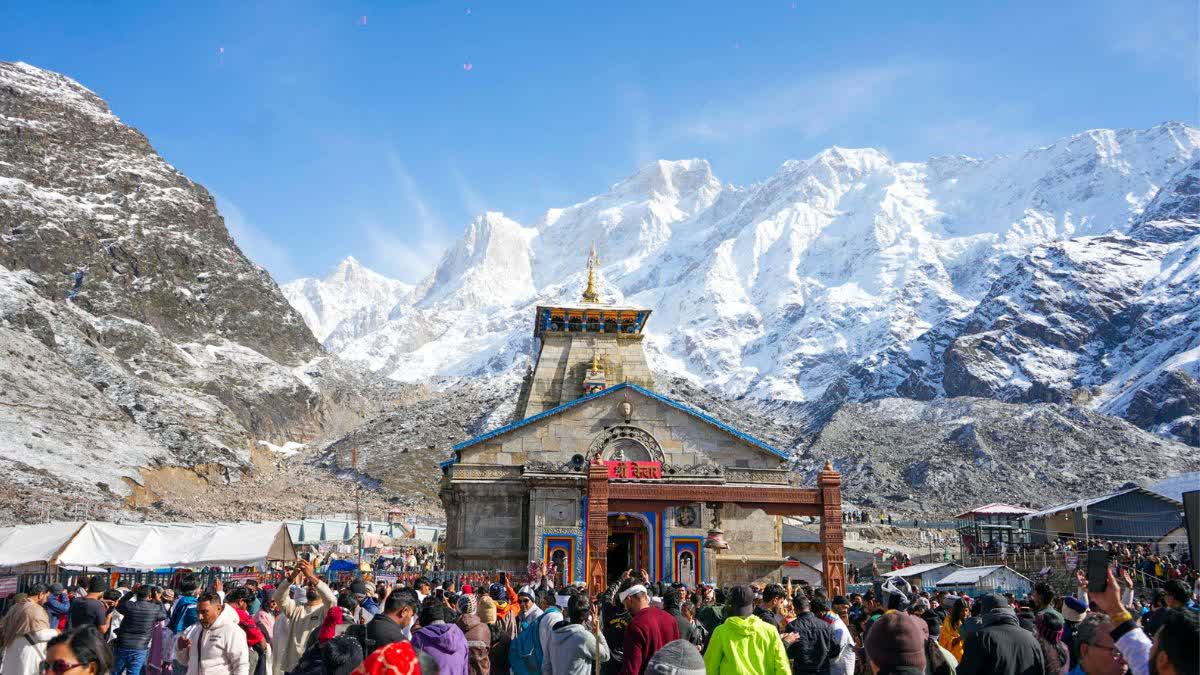Devotees gather at the Kedarnath Temple to offer prayers in Kedarnath, Rudraprayag, Uttarakhand