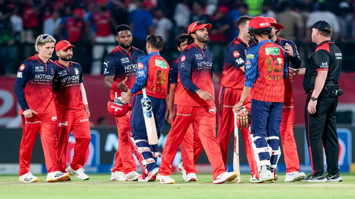 ipl 2026 rcb become first team to qualify for playoffs with 23 run win over pbks first team to qualify for IPL playoffs Urdu News