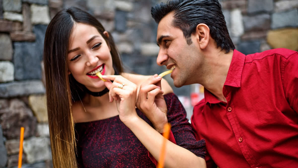 Friends eating French fries