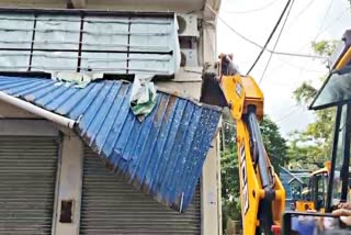 The office of Abhishek Banerjee being demolished on Saturday.