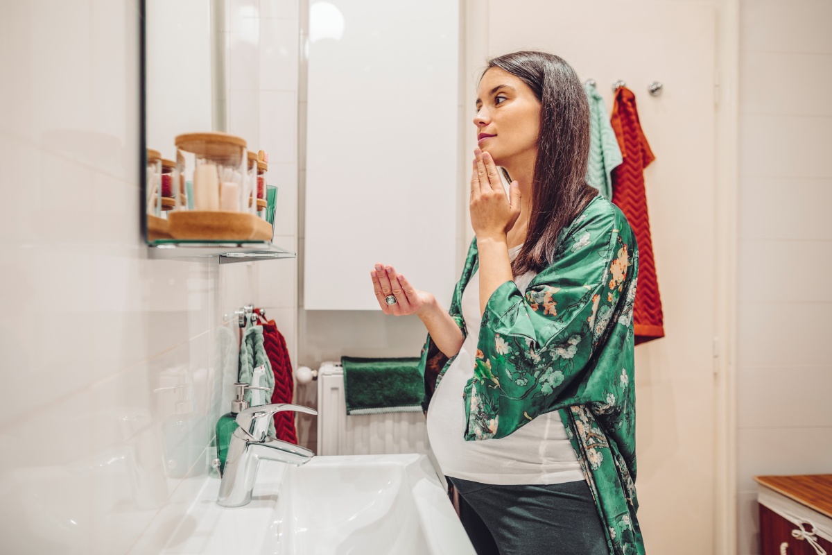 Pregnant woman in the bathroom