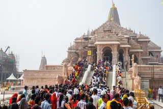 FILE- Devotees visit Shri Ram Janmbhoomi Temple to offer prayers on the occasion of Kartik Purnima, in Ayodhya