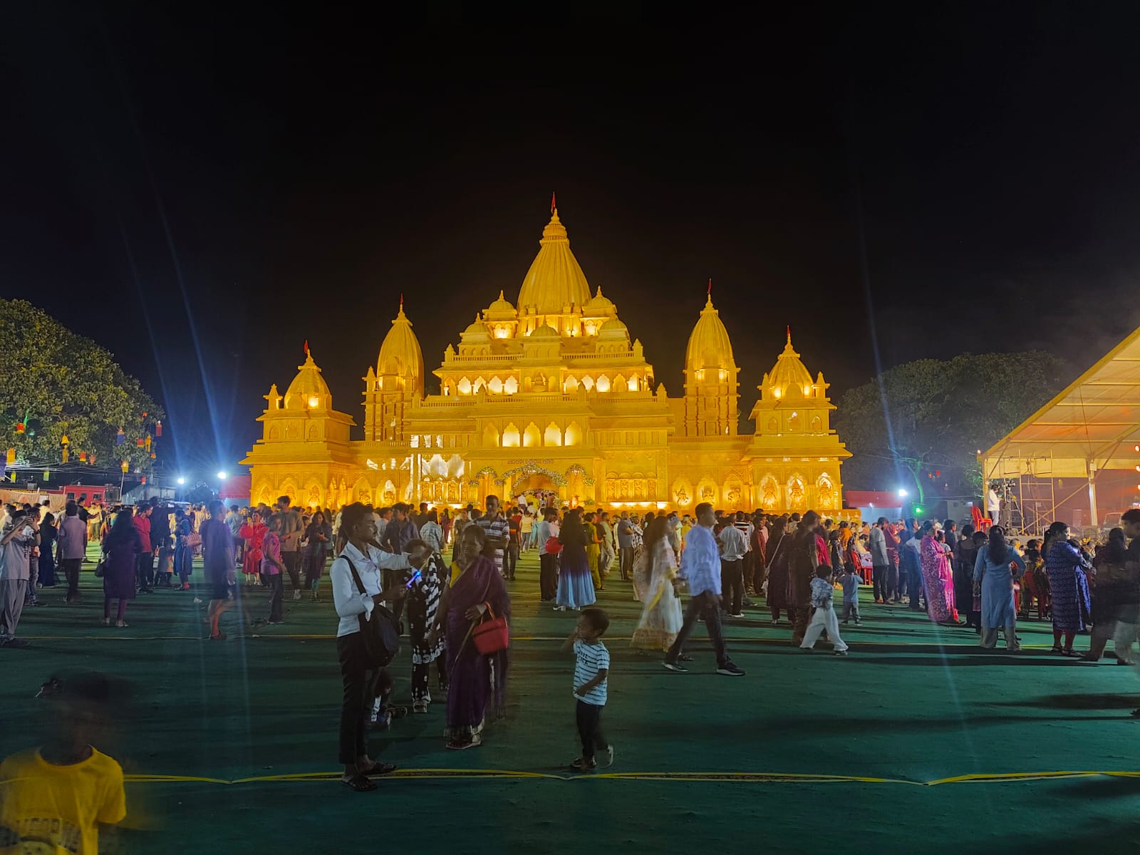 The Durga Puja arch at the Melan Ground  is illuminated.
