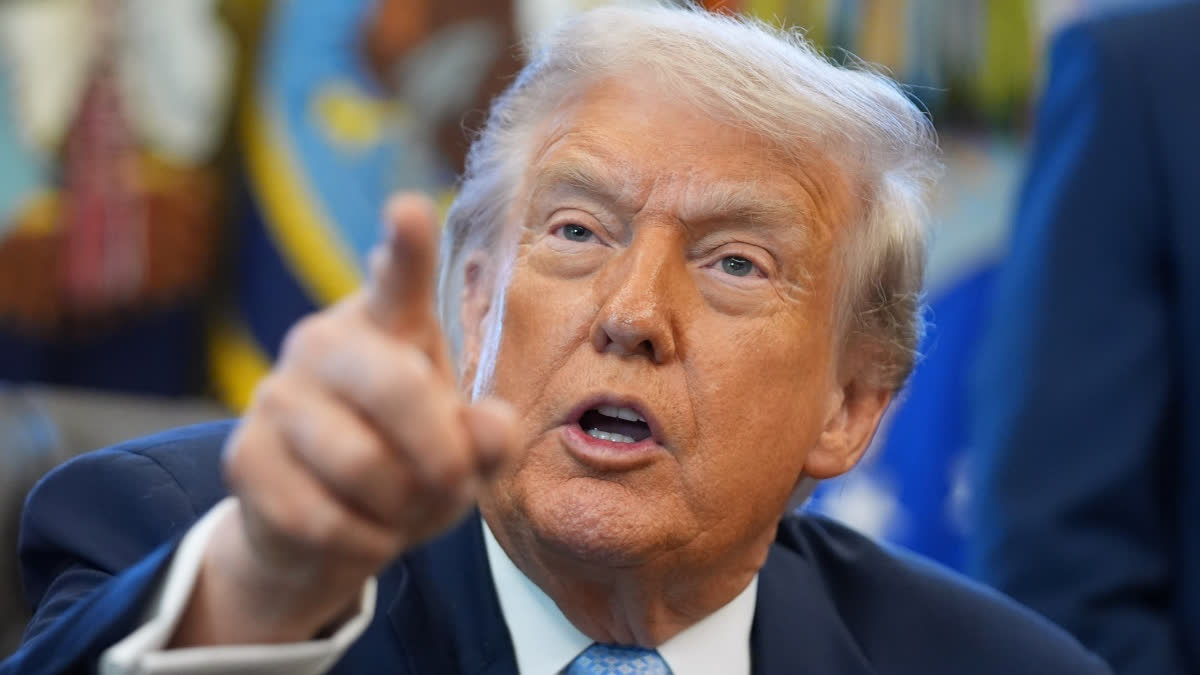 President Donald Trump answers questions from reporters during a meeting with the White House task force on the 2026 FIFA World Cup in the Oval Office of the White House, Monday, Nov. 17, 2025, in Washington.