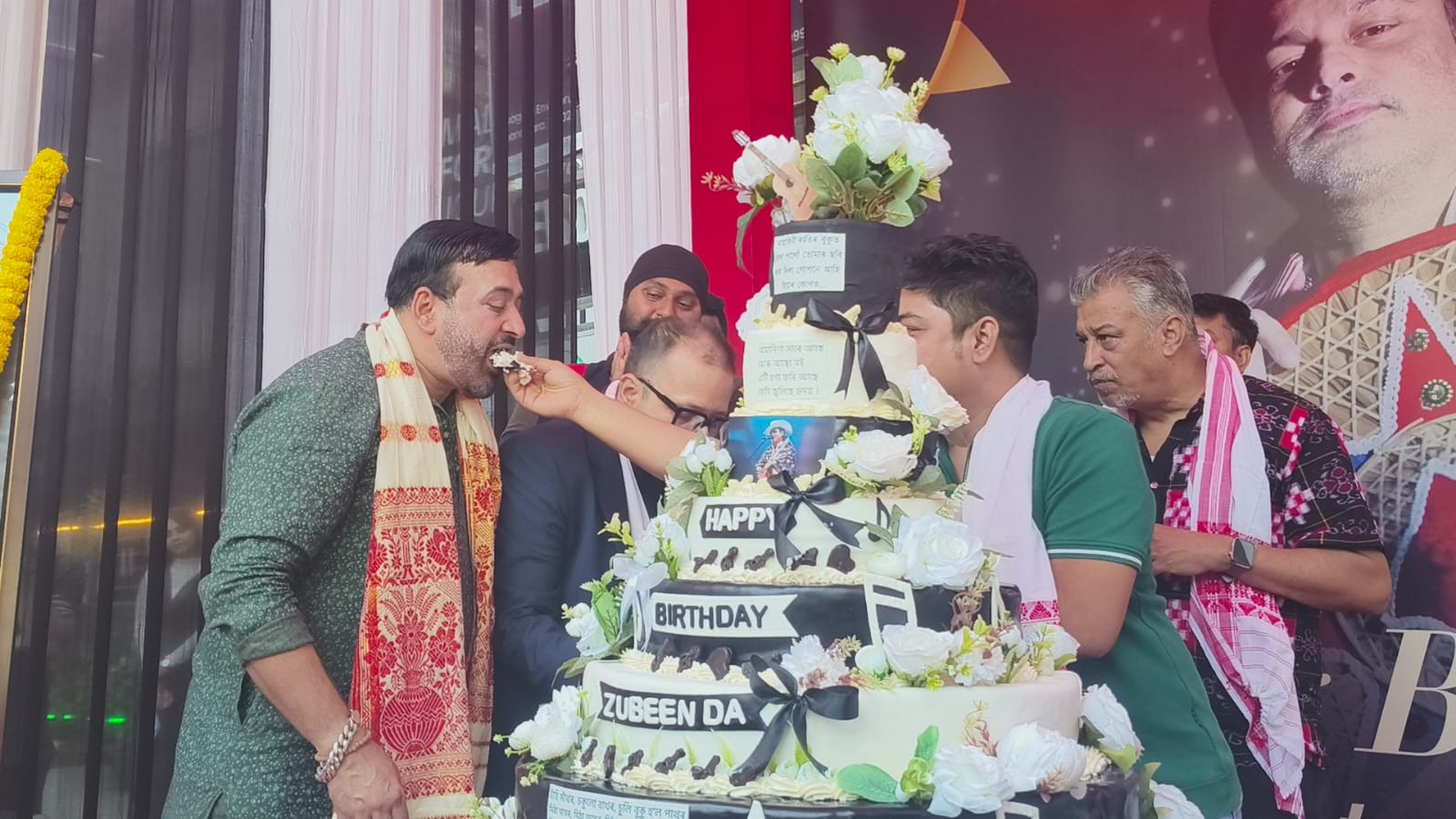 Zubeen garg birthday a fan named rakesh singh cuts a 25kg cake feeds 700 people in guwahati
