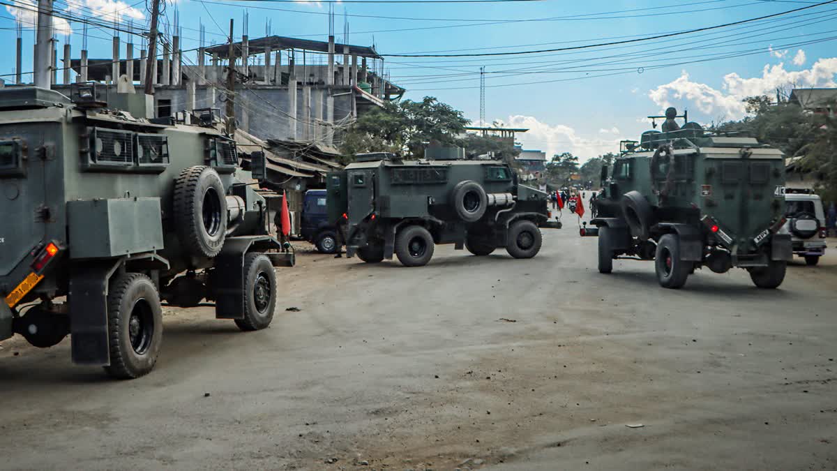 Heavy security convoys stand guard as Internally Displaced Persons and people under the aegis of Coordinating Committee on Manipur Integrity hold a protest, demanding rehabilitation in Imphal East