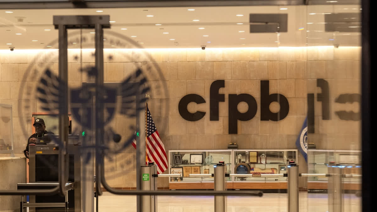 Judge Pauses Trump Administration's Plans For Mass Layoffs At Consumer Financial Protection Bureau FILE - A security officer works inside of the Consumer Financial Protection Bureau (CFPB) building headquarters Monday, Feb. 10, 2025, in Washington.