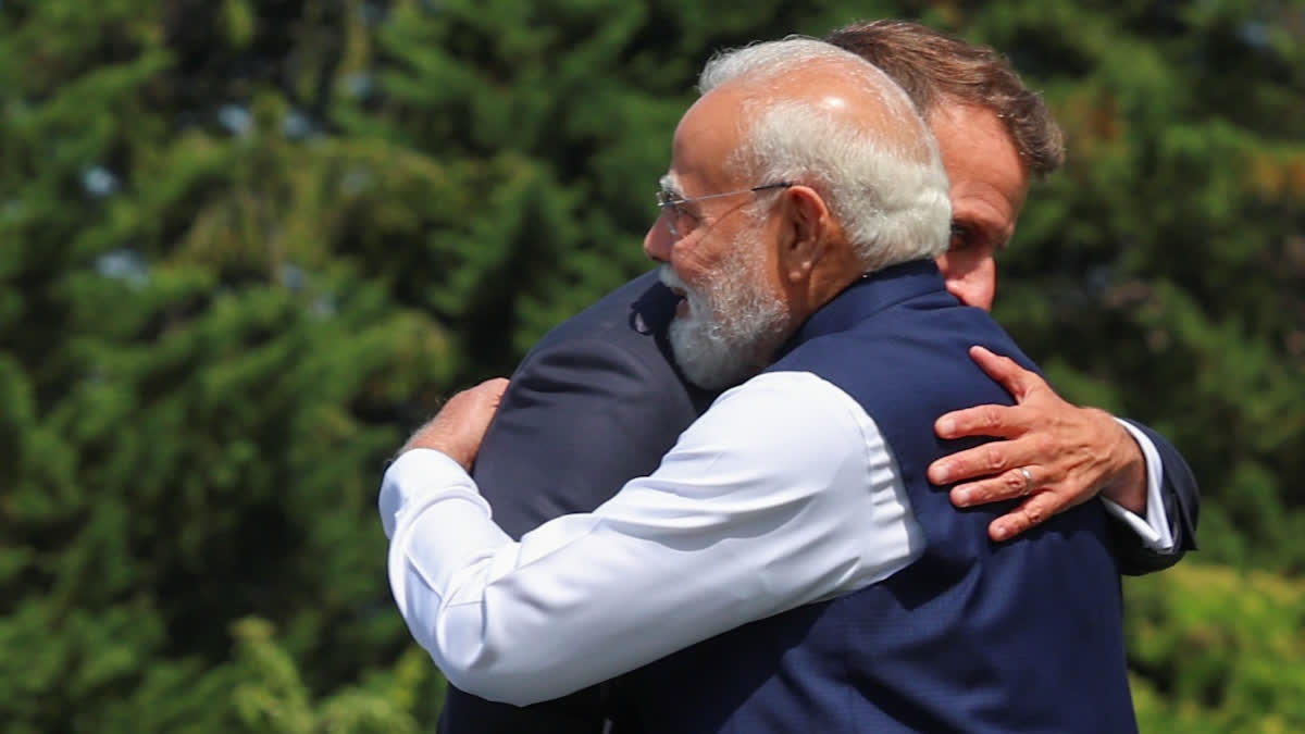 In this image received on June 16, 2026, Prime Minister Narendra Modi being welcomed by French President Emmanuel Macron for the G7 Summit, in Evian-les-Bains, France.