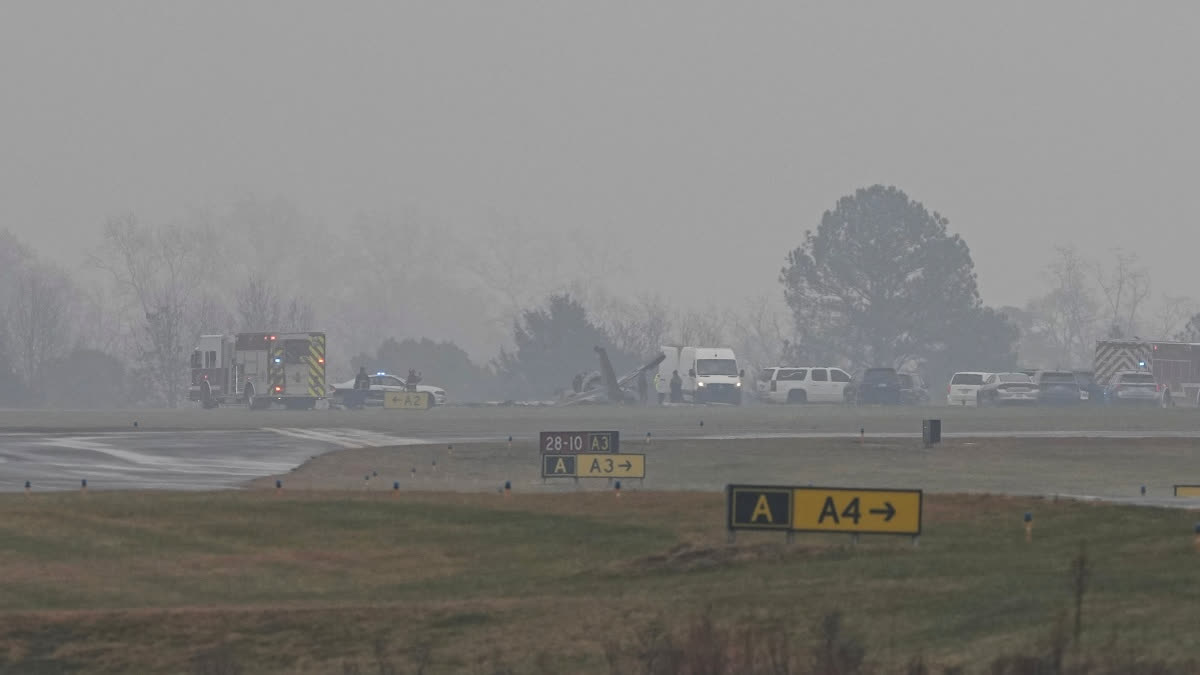 Ex-NASCAR Driver Among 7 Killed In US Private Jet Crash First responders tend to the scene of a reported plane crash at a regional airport in Statesville, N.C., Thursday, Dec. 18, 2025.
