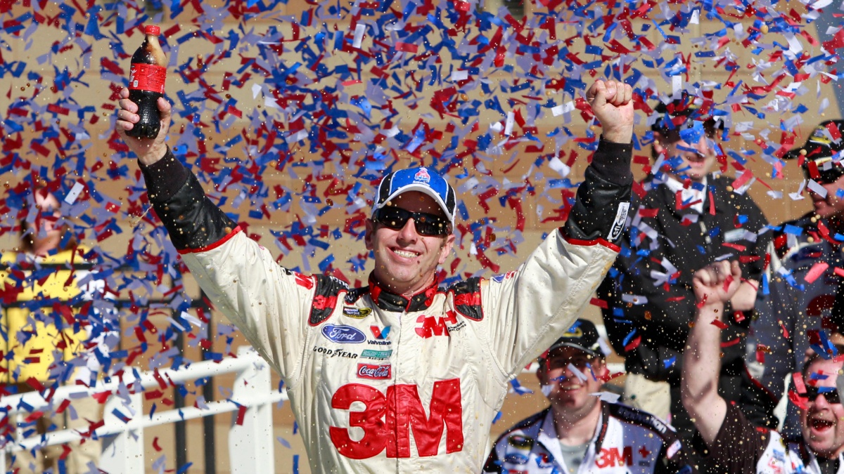 FILE - Greg Biffle celebrates in victory lane after winning the NASCAR Sprint Cup Series auto race at Kansas Speedway on Sunday, Oct. 3, 2010, in Kansas City, Kan.