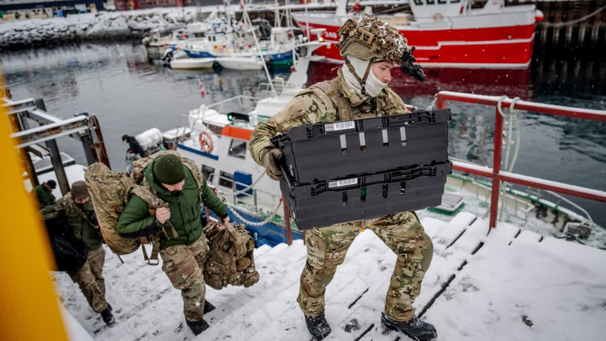 Danish soldiers disembark at the harbor in Nuuk, Greenland, on Sunday, Jan. 18, 2026.