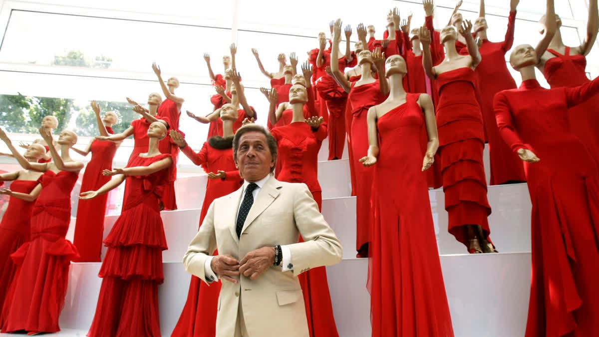Valentino Garavani with his best red dresses