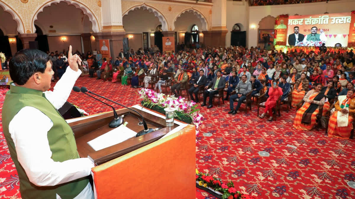 Madhya Pradesh Chief Minister Mohan Yadav addresses the women empowerment programme after transferring funds to beneficiaries under the 'Ladli Behna Scheme', at Kushabhau Thackeray convention center, in Bhopal