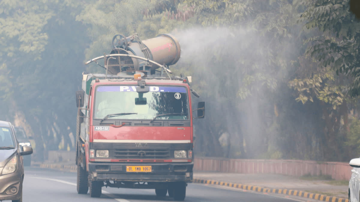 Experts Identify Factors Driving Delhi-NCR Winter Pollution; Government Seeks Public Suggestions An anti-smog gun vehicle sprays fine water droplets to curb air pollution in New Delhi