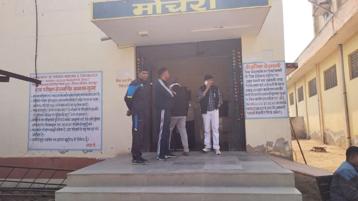 Relatives gathered outside the mortuary
