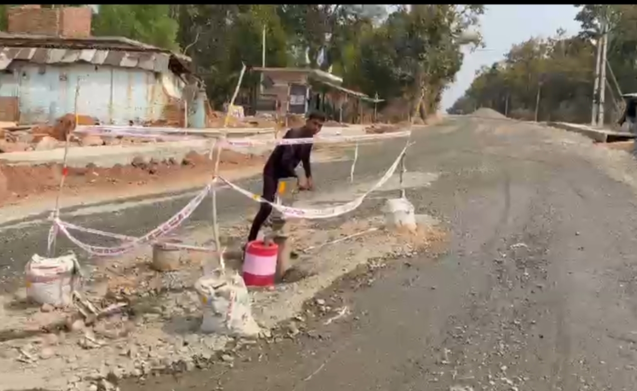 Handpump in middle of road