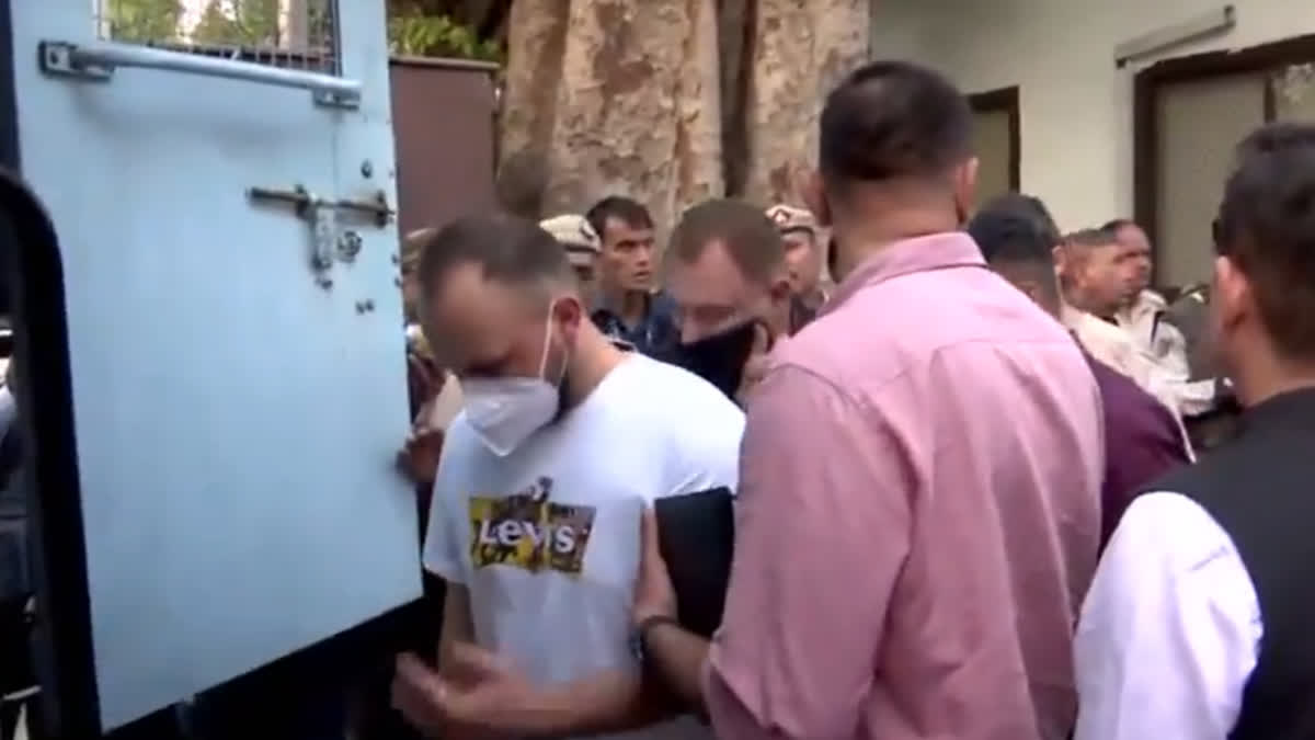 Ukraine Seeks Consular Access To 6 Citizens Arrested In India The arrested foreigners being taken away from the Patiala House Court after being produced before the NIA court, in New Delhi on Monday.
