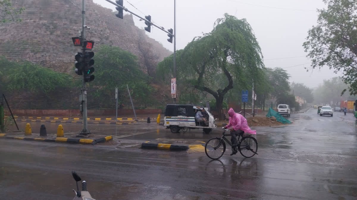 Rain-soaked roads in Delhi after widespread showers across the city.