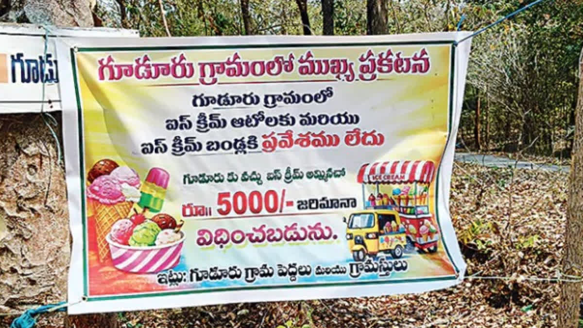 Banner warning vendors against selling ice cream, with a Rs 5,000 fine announced for violations.