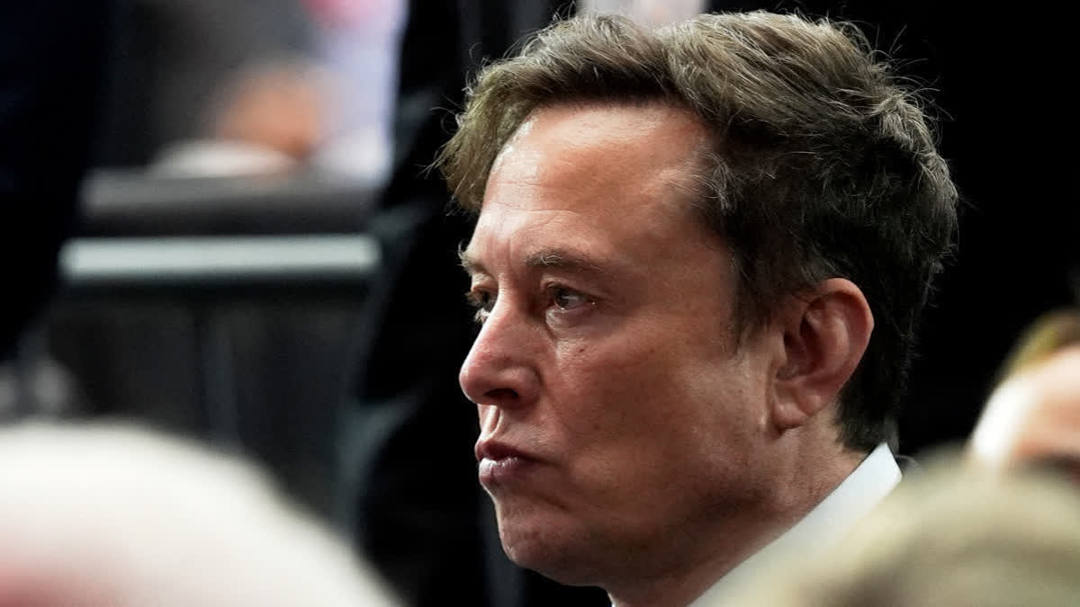 FILE - Elon Musk attends a memorial for conservative activist Charlie Kirk, Sunday, Sept. 21, 2025, at State Farm Stadium in Glendale, Ariz.