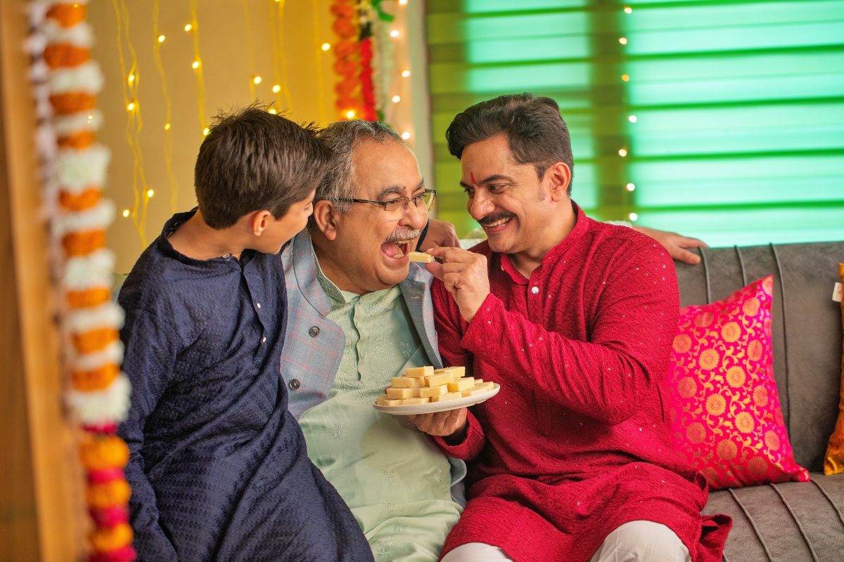 Family eating Indian festive food