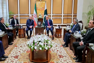 In this photo released by the Pakistan Prime Minister Office, visiting Iranian delegation headed by Iran's Parliament Speaker Mohammad Bagher Ghalibaf, third left, meet with Pakistani Prime Minister Shehbaz Sharif, in Islamabad, Pakistan, Saturday, April 11, 2026
