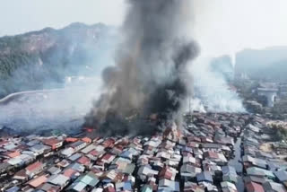 This image made from video provided by Bernama TV shows a fire at a Malaysian coastal settlement in the Sandakan district of Sabah state on Borneo Island, Malaysia, Sunday, April 19, 2026.