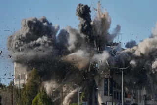 Smoke rises after an Israeli airstrike hits a building near the airport road in Beirut, Lebanon, Tuesday, March 31, 2026.