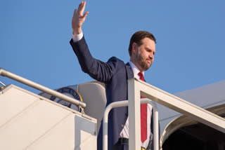 Vice President JD Vance waves goodbye as he boards Air Force Two to leave Islamabad, Sunday, April 12, 2026, after attending talks on Iran.
