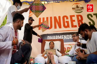 Climate activist Sonam Wangchuk being attended by medical professionals as CJP founder Abhijeet Dipke looks on during a protest at Jantar Mantar, in New Delhi, Wednesday, July 15, 2026