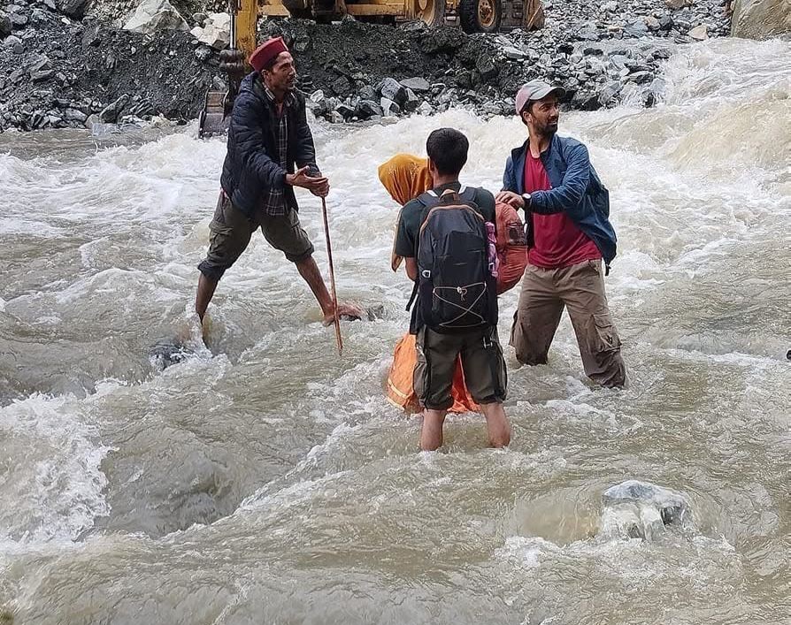 UTTARKASHI VILLAGERS CROSSING RIVER