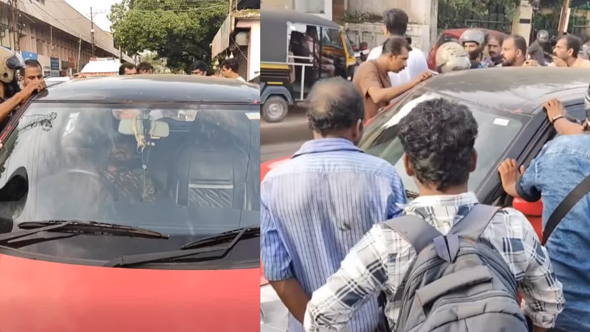 man sleep ettumanoor road നടുറോഡില്‍ കാറില്‍ ഉറക്കം ettumanoor junction car sleeping kottayam news