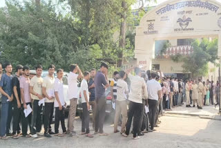 Candidates queue up at the examination centre in Jaipur's Brahmapuri area