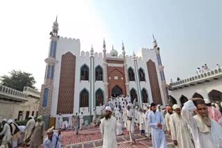 Muslim worshippers come out of a mosque in Nuh, Haryana