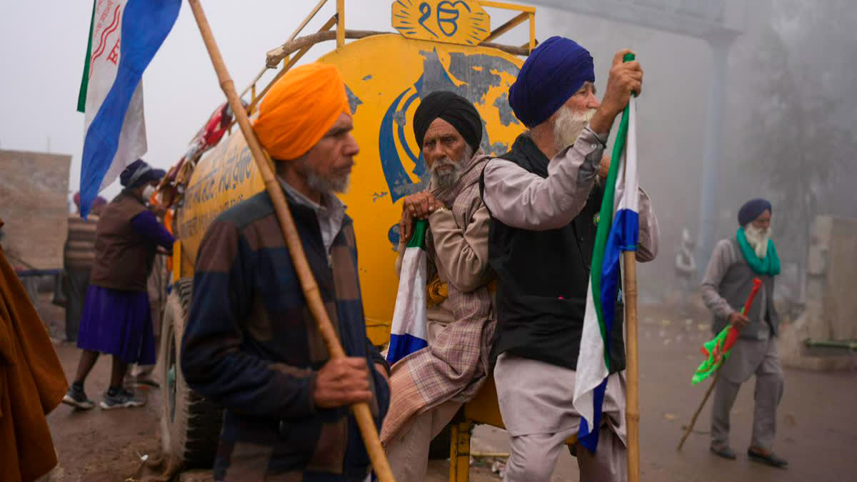 In Frames: Farmers Resume Protest after Talks Fail Police fired tear gas at farmers who resumed their protest march to New Delhi on Feb 21 (AP Photo)
