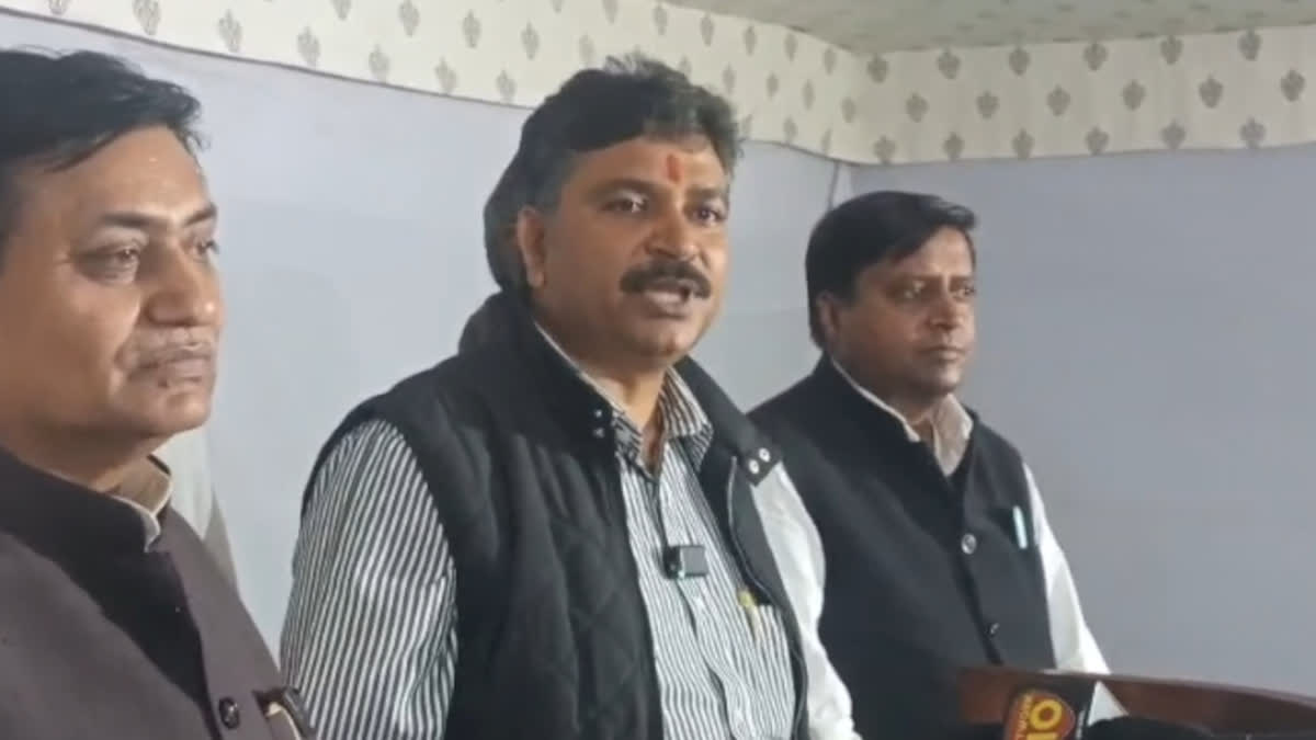 Tikaram Jully speaking at a press conference