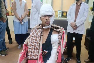 Young man in hospital after surgery