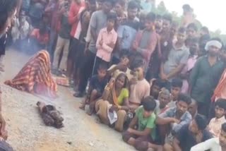 DEAD BODY TAKEN OUT FROM GRAVE