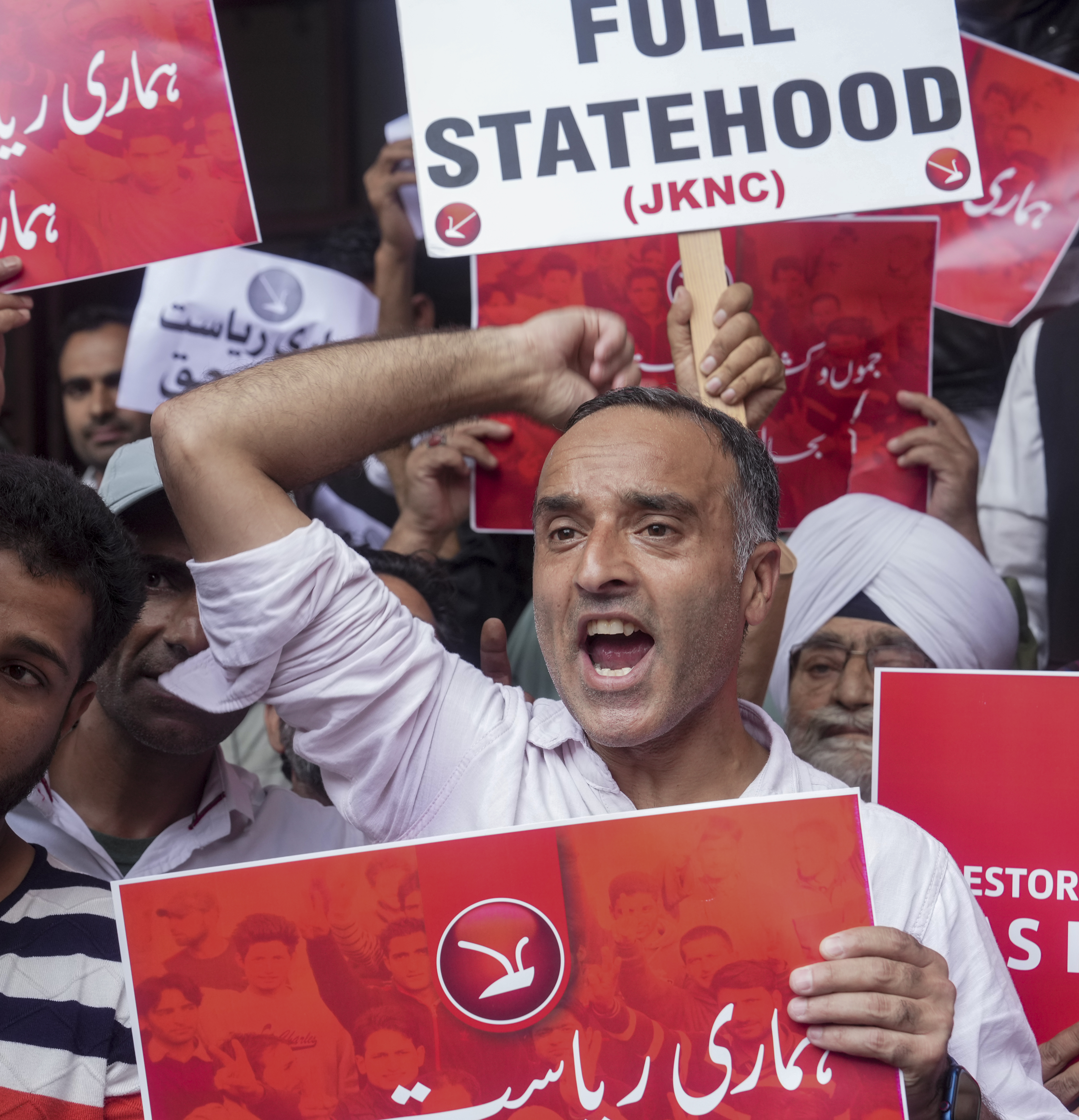 NC workers protest to demand restoration of statehood to J&K