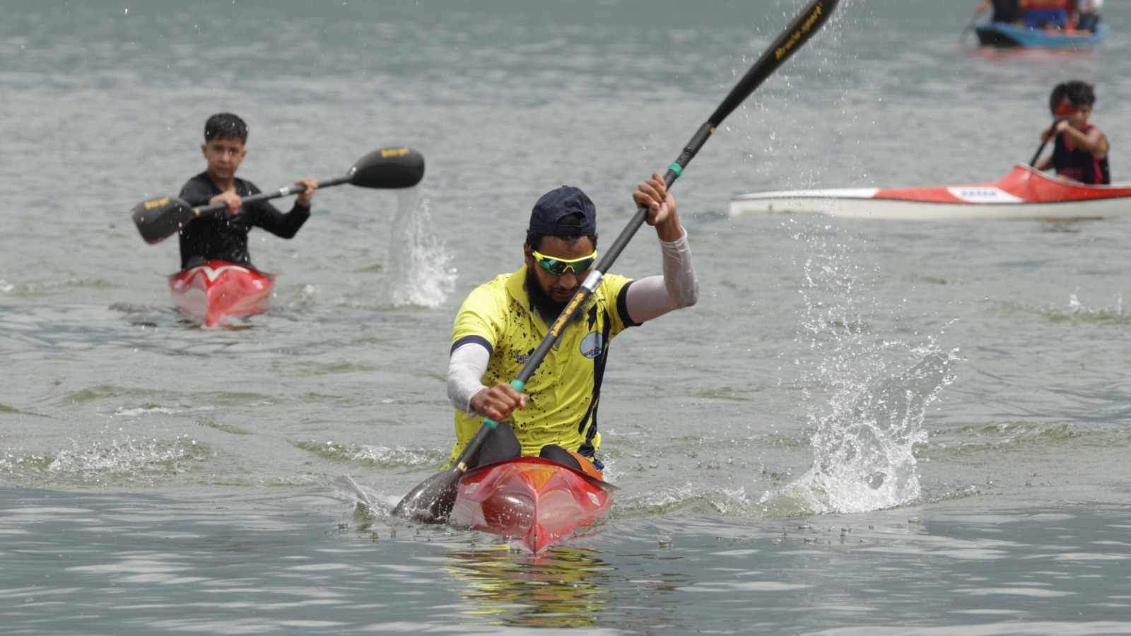 File photo of participants during a water sports competition in Dal Lake.