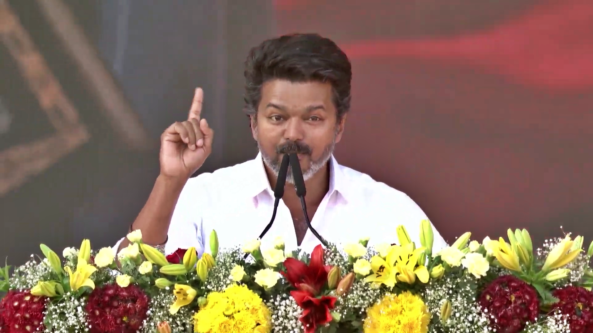 Screengrab of TVK founder Vijay addressing party workers the party's second state conference in Parapathi near Madurai on Thursday.