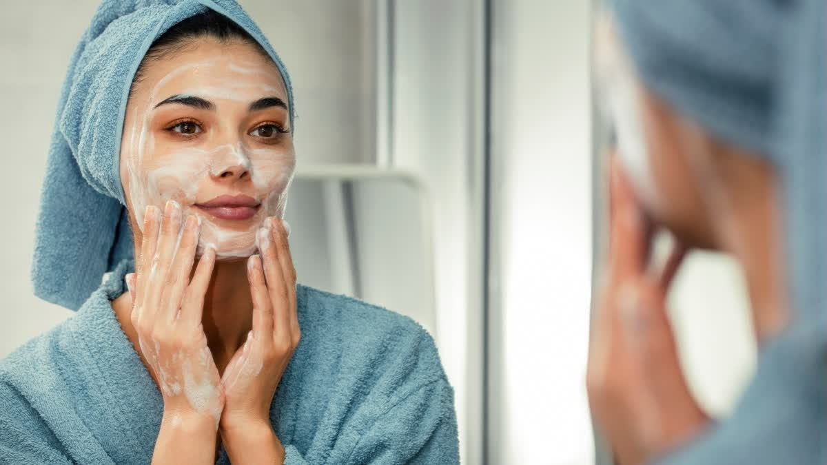 Woman using a face wash