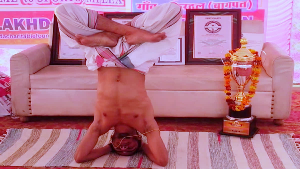 Om Yogi Shirshasana Record