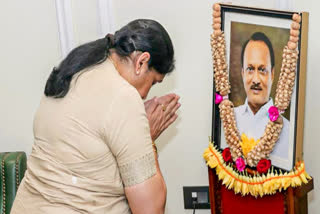 FILE- Sunetra Ajit Pawar pays respect to her late husband and Maharashtra Deputy Chief Minister Ajit Pawar as she takes charge as the new Deputy Chief Minister, in Mumbai.
