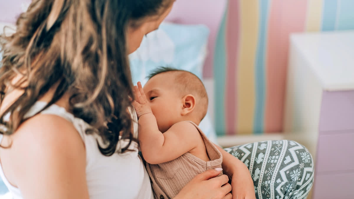 Breastfeeding Does More Than Nourish Babies, It May Protect From Childhood Cancer According To Medical Research Woman breastfeeding a baby