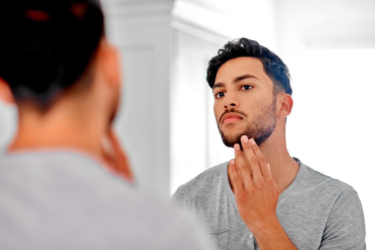 Man with patchy or thin facial hair