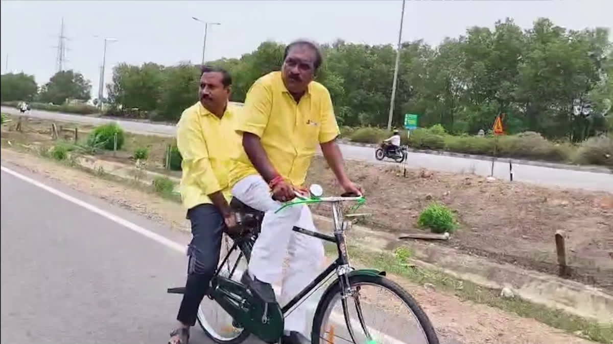 Minister Nimmala Rode A Bicycle Along With Palla Srinivasa Rao