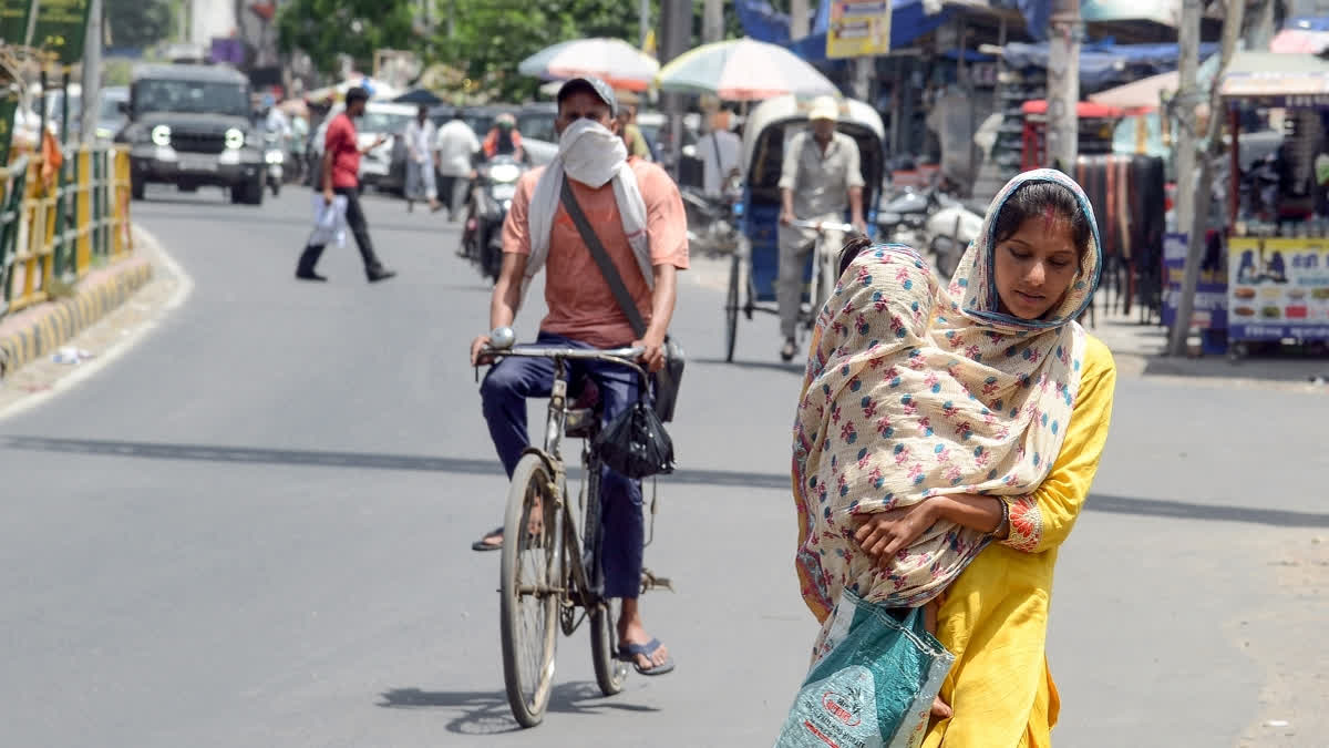India Faces Dual Weather Crisis: 48°C Heatwave Hits North, Thunderstorm Alerts For 14 States