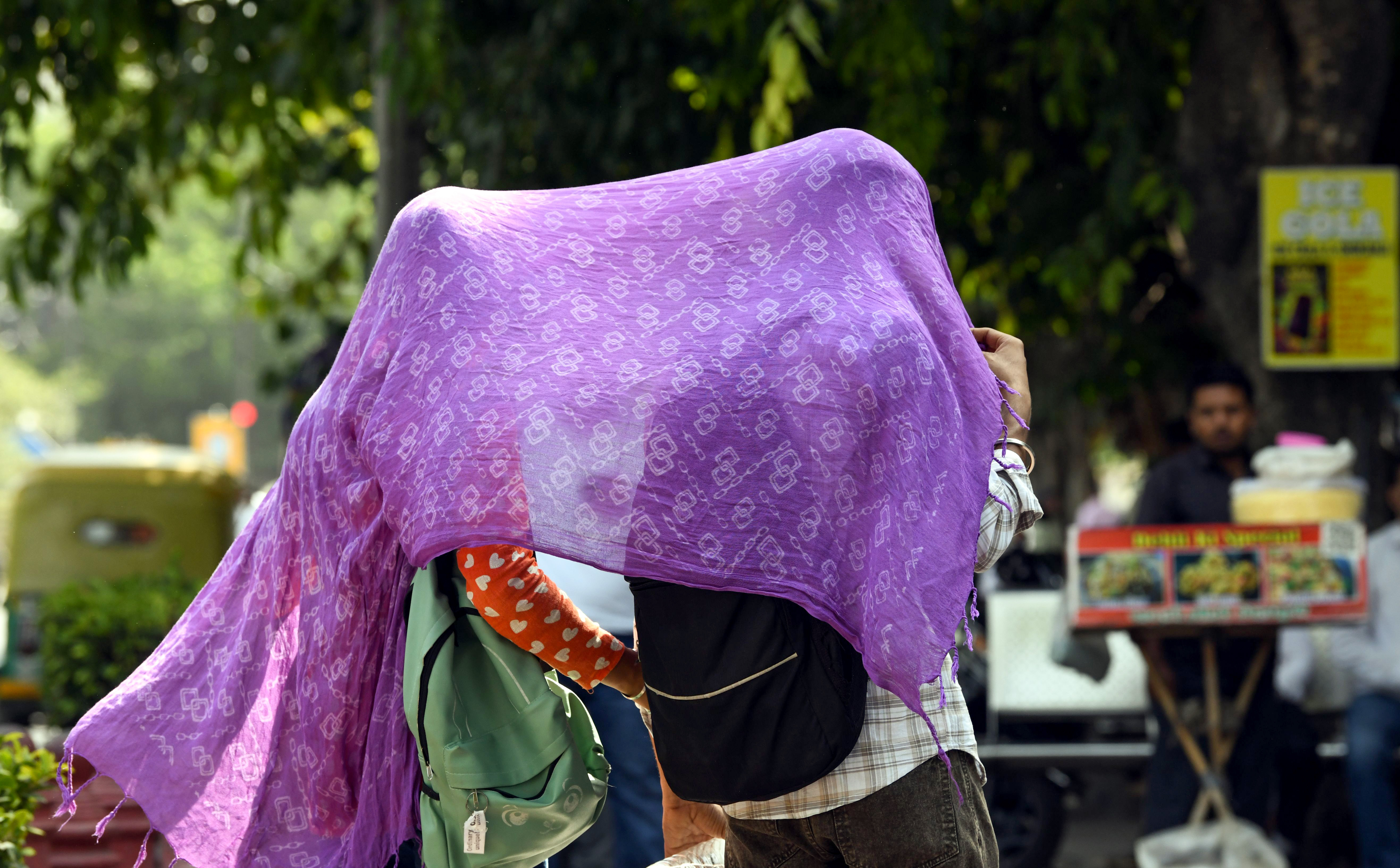 India Faces Dual Weather Crisis: 48°C Heatwave Hits North, Thunderstorm Alerts For 14 States